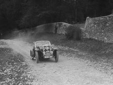 Singer 2-seater sports competing in a motoring trial, Nailsworth Ladder, Gloucestershire, 1930s.. Artist: Bill Brunell