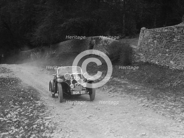 Singer 2-seater sports competing in a motoring trial, Nailsworth Ladder, Gloucestershire, 1930s.. Artist: Bill Brunell.