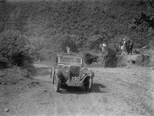 Singer 9 sports saloon competing in the Mid Surrey AC Barnstaple Trial, Beggars Roost, Devon, 1934. Artist: Bill Brunell