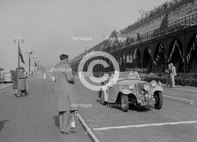 Singer Nine sports of CE Cole at the RAC Rally, Madeira Drive, Brighton, 1939. Artist: Bill Brunell.
