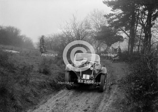 Singer of AE Carr at the Sunbac Colmore Trial, Gloucestershire, 1934. Artist: Bill Brunell.