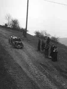 Singer of CV Glass climbing Nailsworth Ladder, Sunbac Colmore Trial, Gloucestershire, 1934. Artist: Bill Brunell