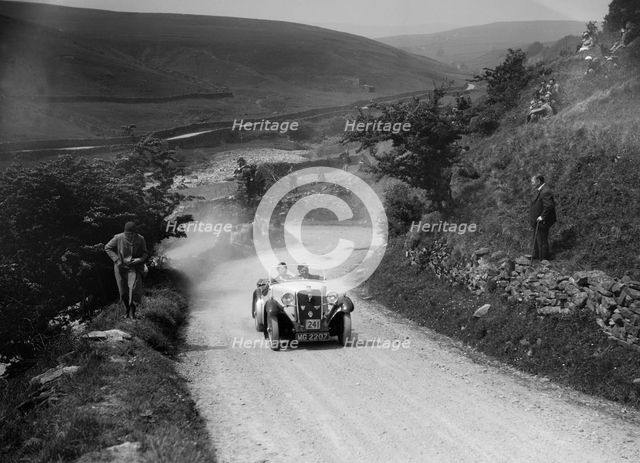 Singer of J Selwyn competing in the MCC Edinburgh Trial, West Stonesdale, Yorkshire Dales, 1933. Artist: Bill Brunell.