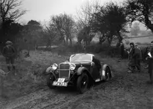 Singer of L Sandford at the Sunbac Colmore Trial, near Winchcombe, Gloucestershire, 1934. Artist: Bill Brunell