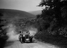 Singer of LA Sandford competing in the MCC Edinburgh Trial, West Stonesdale, Yorkshire Dales, 1933. Artist: Bill Brunell