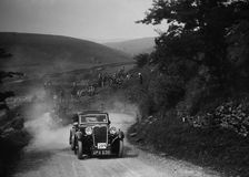 Singer of LA Sandford competing in the MCC Edinburgh Trial, West Stonesdale, Yorkshire Dales, 1933. Artist: Bill Brunell
