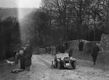 Singer of WDV Norman climbing Nailsworth Ladder, Sunbac Colmore Trial, Gloucestershire, 1934. Artist: Bill Brunell