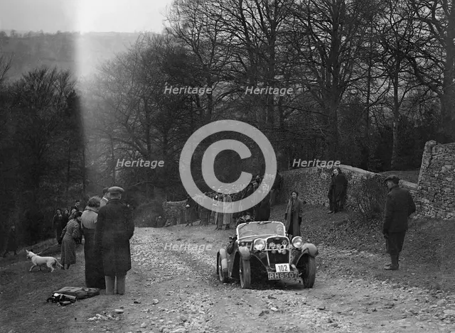Singer of WDV Norman climbing Nailsworth Ladder, Sunbac Colmore Trial, Gloucestershire, 1934. Artist: Bill Brunell.