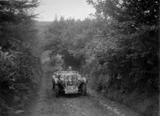 Singer open 2-seater competing in the Mid Surrey AC Barnstaple Trial, 1934. Artist: Bill Brunell