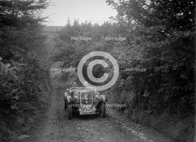 Singer open 2-seater competing in the Mid Surrey AC Barnstaple Trial, 1934. Artist: Bill Brunell.