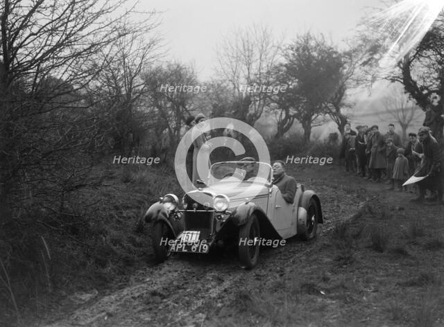 Singer open sports of WJD Richardson, Sunbac Colmore Trial, near Winchcombe, Gloucestershire, 1934. Artist: Bill Brunell.