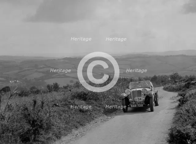 Singer B37 1.5 litre sports of EB Booth of the Autosports team at the MCC Torquay Rally, 1938. Artist: Bill Brunell.