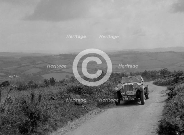 Singer B37 1.5 litre sports of EB Booth of the Autosports team at the MCC Torquay Rally, 1938. Artist: Bill Brunell.