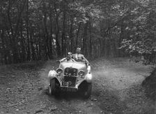 Singer competing in the B&HMC Brighton-Beer Trial, Fingle Bridge Hill, Devon, 1934. Artist: Bill Brunell
