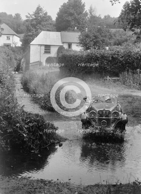 Singer competing in the B&HMC Brighton-Beer Trial, Windout Lane, near Dunsford, Devon, 1934. Artist: Bill Brunell.