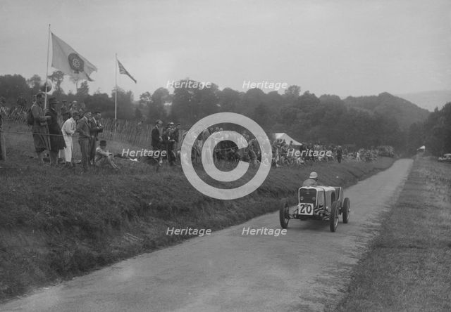 Singer competing in the Shelsley Walsh Hillclimb, Worcestershire, 1935. Artist: Bill Brunell.