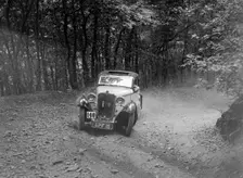 Singer coupe competing in the B&HMC Brighton-Beer Trial, Fingle Bridge Hill, Devon, 1934. Artist: Bill Brunell