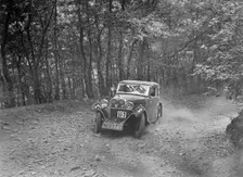 Singer coupe competing in the B&HMC Brighton-Beer Trial, Fingle Bridge Hill, Devon, 1934. Artist: Bill Brunell