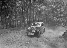 Singer coupe competing in the B&HMC Brighton-Beer Trial, Fingle Bridge Hill, Devon, 1934. Artist: Bill Brunell