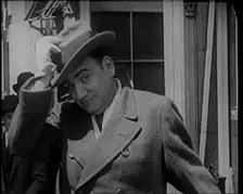 Singer Enrico Carruso Standing in the Street in the United States of America, 1921. Creator: British Pathe Ltd