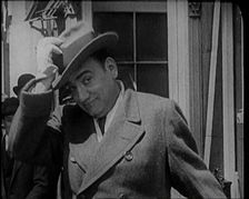 Singer Enrico Carruso Standing in the Street in the United States of America, 1921. Creator: British Pathe Ltd