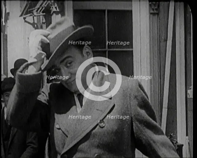Singer Enrico Carruso Standing in the Street in the United States of America, 1921. Creator: British Pathe Ltd.