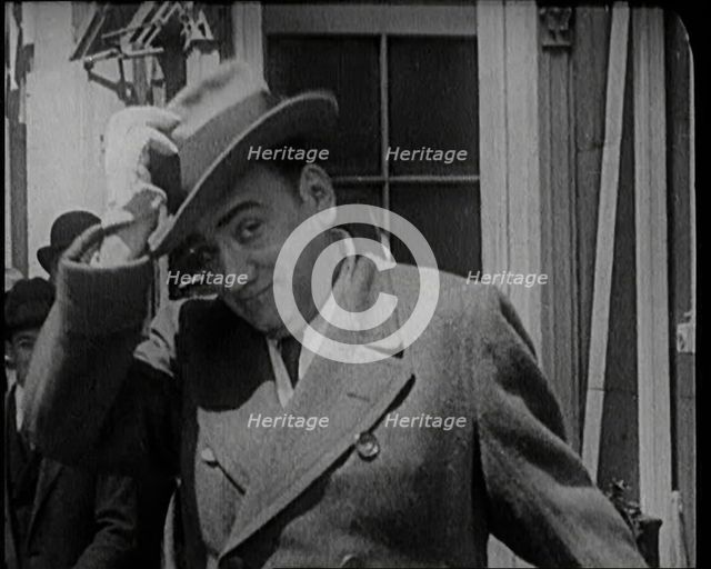 Singer Enrico Carruso Standing in the Street in the United States of America, 1921. Creator: British Pathe Ltd.