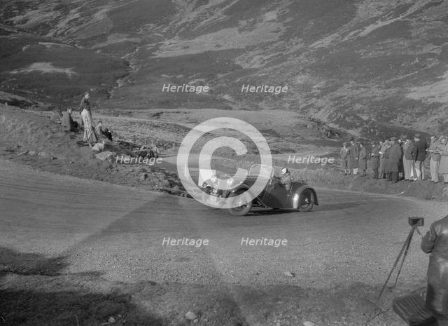 Singer Le Mans 2-seater competing in the RSAC Scottish Rally, Devil's Elbow, Glenshee, 1934. Artist: Bill Brunell.