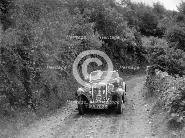 Singer Le Mans competing in the Mid Surrey Automobile Club Barnstaple Trial, 1934. Artist: Bill Brunell.