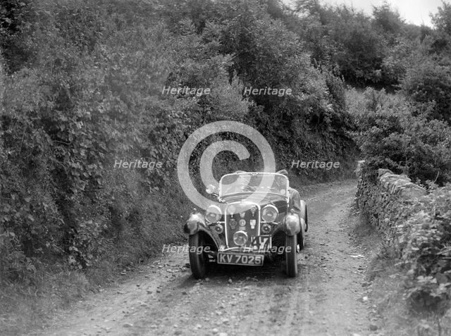 Singer Le Mans competing in the Mid Surrey Automobile Club Barnstaple Trial, 1934. Artist: Bill Brunell.