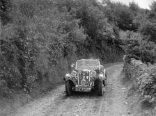 Singer Le Mans competing in the Mid Surrey Automobile Club Barnstaple Trial, 1934. Artist: Bill Brunell