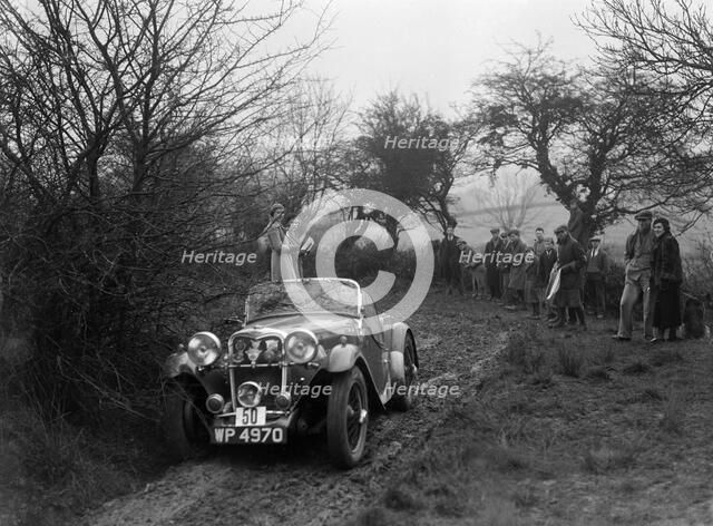 Singer Le Mans of AH Langley at the Sunbac Colmore Trial, near Winchcombe, Gloucestershire, 1934. Artist: Bill Brunell.