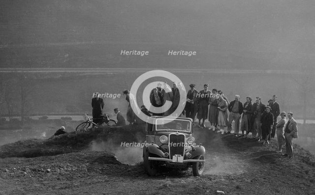 Singer saloon of Michael McEvoy competing in the Sunbac Inter-Club Team Trial, 1935. Artist: Bill Brunell.