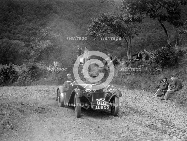 Singer sports 2-seater at the Mid Surrey AC Barnstaple Trial, Beggars Roost, Devon, 1934. Artist: Bill Brunell.