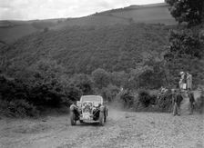 Singer sports competing in the Mid Surrey AC Barnstaple Trial, Beggars Roost, Devon, 1934. Artist: Bill Brunell