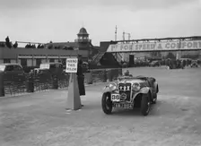 Singer sports competing in the JCC Rally, Brooklands, Surrey, 1939. Artist: Bill Brunell