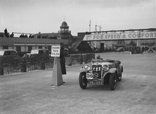 Singer sports competing in the JCC Rally, Brooklands, Surrey, 1939. Artist: Bill Brunell