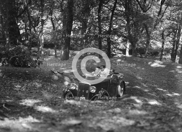 Singer taking part in the B&HMC Brighton-Beer Trial, Fingle Bridge Hill, Devon, 1934. Artist: Bill Brunell.