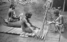 Singhalese weaving mats, 1902. Creator: S. Slinn & Co.