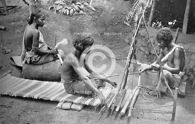 Singhalese weaving mats, 1902. Creator: S. Slinn & Co..