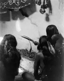 Singing to the snakes, Shipolovi, c1906. Creator: Edward Sheriff Curtis