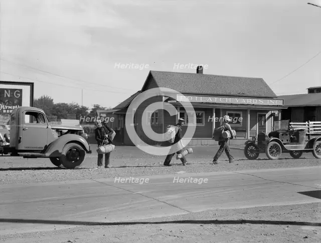 Single itinerant men on way to railroad yard, near Toppenish, Yakima Valley, Washington, 1939. Creator: Dorothea Lange.