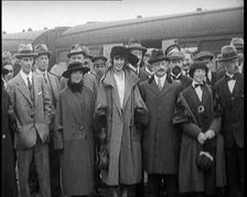 Sinn Fein Delegates Standing by a Train After Arriving in London, 1922. Creator: British Pathe Ltd