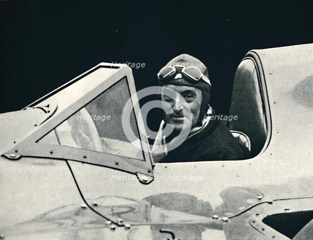''Sir Malcolm Campbell at the wheel of Bluebird', 1937. Artist: Unknown.