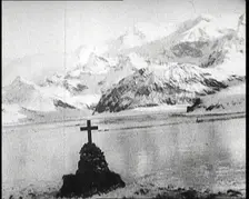 Sir Ernest Shackleton's Grave, Marked with a Cross, on South Georgia Island, 1922. Creator: British Pathe Ltd