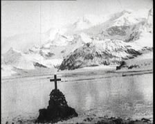 Sir Ernest Shackleton's Grave, Marked with a Cross, on South Georgia Island, 1922. Creator: British Pathe Ltd