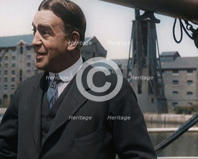 Sir Ernest Shackleton Standing on a Boat, 1921. Creator: British Pathe Ltd.