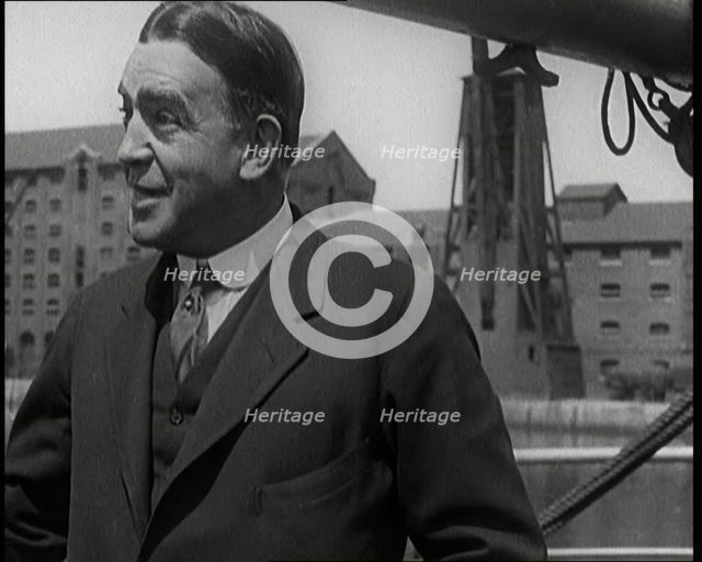 Sir Ernest Shackleton Standing on a Boat, 1921. Creator: British Pathe Ltd.