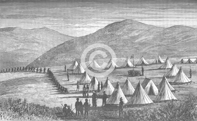 'Sir Garnet Wolseley's Camp at Ulundi: Zulus Coming In To Give Up Their Arms', c1880. Artist: Unknown.