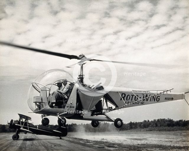 Sir Gordan Covell in a helicopter, Beltsville, Maryland, 1948. Creator: Unknown.